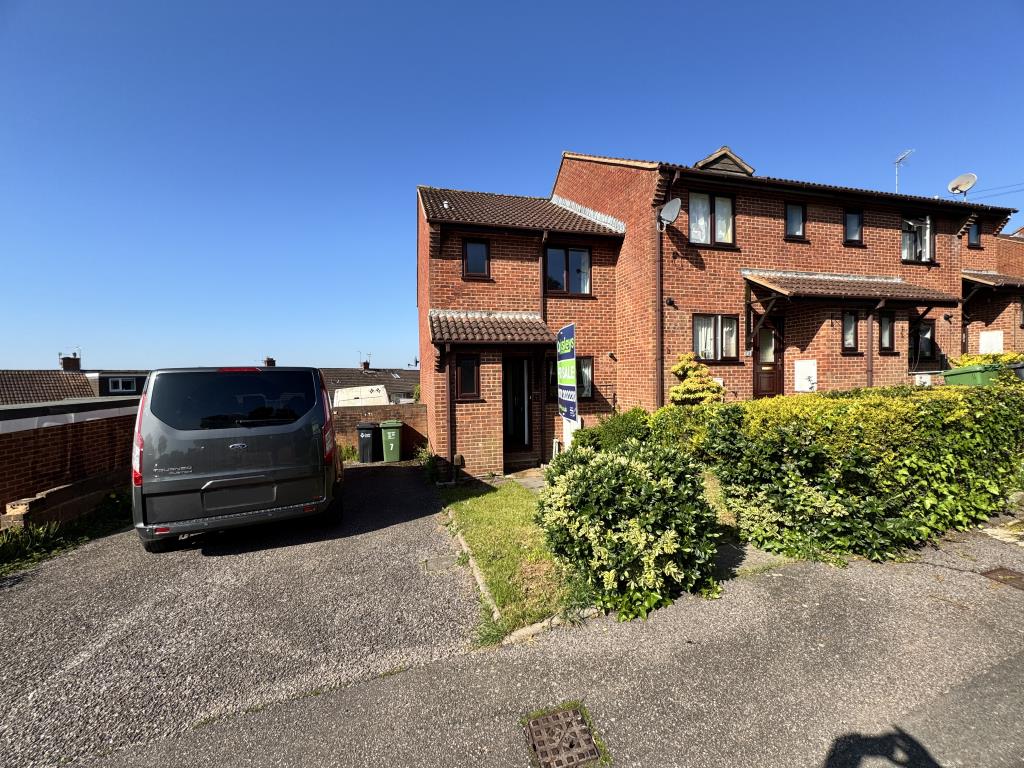 Lot: 76 - TWO-BEDROOM END-TERRACE HOUSE - Front of the property showing the large Drive